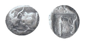 CARIA. Uncertain. 5th century BC. Obol Obv: Confronted foreparts of two bulls. Rev: Head and neck of a bull to right within incuse square. Condition: ...