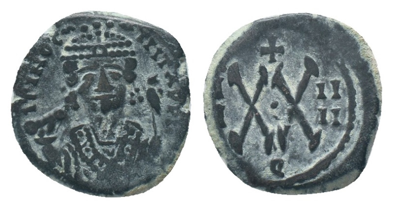 Phocas. AD 602-610. AE Half follis. Antioch Obv: DM FOCA PERP AVG, crowned, mant...