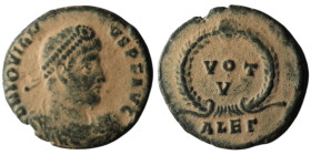 Jovian (AD 363-364). Alexandria
AE Follis (20mm, 2,48g)
Obv: D N IOVIANVS P F AVG. Pearl-diademed, draped and cuirassed bust to right 
Rev: VOT • V in...