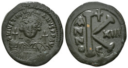 JUSTINIAN I (527-565). Half Follis.
Obv: D N IVSTINIANVS P P AVG.
Helmeted and cuirrased facing bust, holding globus cruciger and shield with horseman...