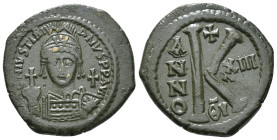 JUSTINIAN I (527-565). Half Follis.
Obv: D N IVSTINIANVS P P AVG.
Helmeted and cuirrased facing bust, holding globus cruciger and shield with horseman...