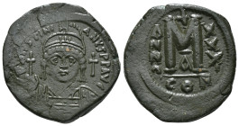 JUSTINIAN I (527-565). Follis.
Obv: D N IVSTINIANVS P P AVG.
Helmeted and cuirassed bust facing, holding globus cruciger and shield decorated with hor...