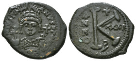 JUSTINIAN I (527-565). Half Follis.
Obv: D N IVSTINIANVS P P AVG.
Helmeted and cuirrased facing bust, holding globus cruciger and shield with horseman...