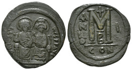 JUSTIN II, with SOPHIA (565-578). Follis.
Obv: D N IVSTINVS PP AVG.
Justin and Sophia seated facing on double throne, holding globus cruciger and cruc...