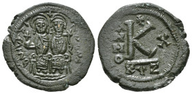 JUSTIN II, with SOPHIA (565-578). Follis.
Obv: D N IVSTINVS PP AVG.
Justin and Sophia seated facing on double throne, holding globus cruciger and cruc...