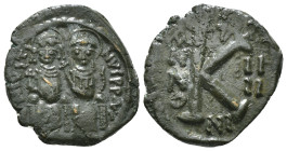 JUSTIN II, with SOPHIA (565-578). Follis.
Obv: D N IVSTINVS PP AVG.
Justin and Sophia seated facing on double throne, holding globus cruciger and cruc...