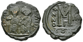 JUSTIN II, with SOPHIA (565-578). Follis.
Obv: D N IVSTINVS PP AVG.
Justin and Sophia seated facing on double throne, holding globus cruciger and cruc...