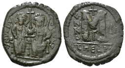 JUSTIN II, with SOPHIA (565-578). Follis.
Obv: D N IVSTINVS PP AVG.
Justin and Sophia seated facing on double throne, holding globus cruciger and cruc...