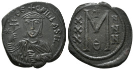 THEOPHILUS (829-842). Follis. Constantinople.
Obv: ✷ ΘЄOFIL ЬASIL.
Crowned and draped bust facing, holding patriarchal cross and akakia.
Rev: Large M;...