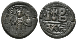Constans II, 641-668. 12 Nummi, Alexandria. Constans II standing facing, wearing crown surmounted by cross, holding long cross with his right hand and...