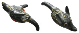 Antiquities 
A Roman bronze figurine of an wolf (?) head
8,64 g - 34,50 mm