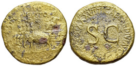 Divus Augustus (died AD 14). Æ Sestertius (34mm, 24.61g, 6h). Rome, c. AD 35-6. Augustus, radiate and holding laurel branch and sceptre, seated l. in ...