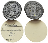 Diocletian (284-305). Radiate (21mm, 3.63g). Cyzicus. Radiate, draped and cuirassed bust r. R/ Diocletian standing r., holding sceptre and receiving V...