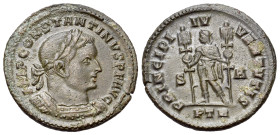 Constantine I (307/310-337). Æ Follis (26mm, 6.05g). Treveri, 307-8. Laureate and cuirassed bust r. R/ Constantine standing l., holding signum in each...