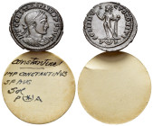 Constantine I (307/310-337). Æ Follis (19mm, 3.30g). Arelate, 318. Laureate, draped and cuirassed bust r. R/ Sol standing l., raising r. hand and hold...
