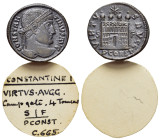 Constantine I (307/310-337). Æ Follis (18mm, 2.68g). Arelate, 328. Pearl-diademed head r. R/ Camp gate with four turrets and open doors; pellet in doo...