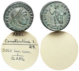 Constantine I (307/310-337). Æ Follis (19mm, 3.14g). Arelate, 313-5. Laureate, draped and cuirassed bust r. R/ Sol standing l., raising r. hand and ho...