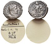 Constantine I (307/310-337). Æ Follis (20mm, 3.26g). Londinium, 315-6. Laureate and cuirassed bust r. R/ Sol standing l., raising r. hand and holding ...