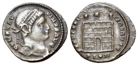 Constantine I (307/310-337). Æ Follis (18mm, 2.21g). Londinium, 324-5. Laureate head r. R/ Camp gate with no doors and two turrets, star above; PLON. ...