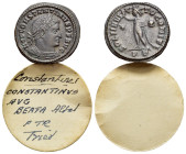 Constantine I 'the Great' (307-337). BI Nummus (20mm, 3.38g, 12h). Ticinum, AD 313-314. Laureate and cuirassed bust to r. R/ Sol wearing chlamys stand...