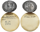 Constantine I 'the Great' (307-337). Æ follis (21mm, 3.24g, 12h). Cyzicus. Laureate bust of Constantine I l., wearing consular robes, holding globe, s...