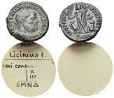 Licinius I (308-324). Æ Follis (19mm, 3.47g). Nicomedia, 321-4. Radiate, draped and cuirassed bust r. R/ Jupiter standing l., holding Victory on globe...
