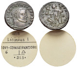 Licinius I (308-324). Æ Follis (19mm, 3.89g). Siscia, 315-6. Laureate head r. R/ Jupiter standing l., holding crowning Victory on globe and sceptre; a...