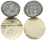 Licinius I (308-324). Æ Follis (20mm, 3.89g). Rome, 312-3. Laureate, draped and cuirassed bust r. R/ Aquila between two signa; RS. RIC VI 348c. VF