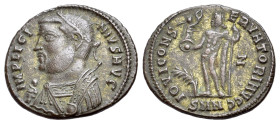 Licinius I (308-324). Æ Follis (19mm,2.80g). Nicomedia 317-320. Laureate and draped bust l., holding mappa, globe and sceptre. R/ Jupiter standing l.,...
