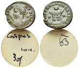 Crispus (Caesar, 316-326). Æ Follis (19mm, 2.96g). Londinium, 322-3. Laureate and cuirassed bust l., holding shield and spear. R/ Globe set upon altar...