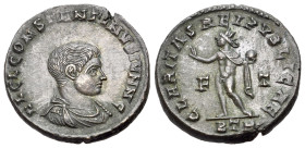 Constantine II (Caesar, 316-337). Æ Follis (19mm, 3.18g). Treveri, 317-8. Bareheaded, draped and cuirassed bust r. R/ Sol standing l., raising hand an...