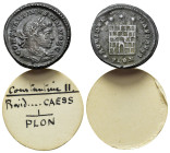 Constantine II (Caesar, 316-337). Æ Follis (20mm, 2.76g). Londinium, 324-5. Laureate, draped and cuirassed bust r. R/ Campgate with no doors and two t...