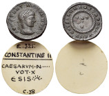 Constantine II (Caesar, 316-337). Æ Follis (18mm, 2.96g). Siscia, 320-321. Laureate head r. R/ VOT/V in two lines within wreath; ΔSIS-star. RIC VII 16...