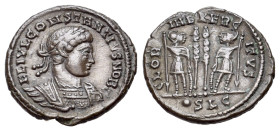 Constantius II (Caesar, 324-337). Æ (17mm, 2.34g). Two soldiers standing facing one another, each holding spear and shield; two signa between; •SLG. R...