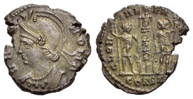 Commemorative Series, 330-354. Æ Follis (15mm, 1.69g). Constantinople, 330. Helmeted and draped bust of Roma l. R/ Signa between two soldiers, each ho...