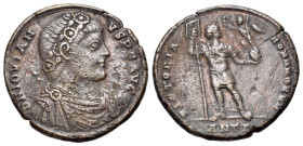 Jovian (363-364). Æ (27mm, 8.76g). Antioch. Rosette-diademed, draped and cuirassed bust r. R/ Emperor standing facing, head r., holding labarum and vi...