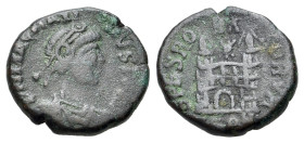 Magnus Maximus (383-388). Æ (12mm, 1.56g, 6h). Arles mint. Diademed, draped and cuirassed bust of Magnus Maximus. R/ SPES ROMANORVM, camp gate with tw...