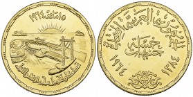 EGYPT, UNITED ARAB REPUBLIC (AD 1958-1971) Gold five-pounds, 1384h (AD 1964) Obverse: representation of the Diversion of the Nile Weight: 25.97g Refer...