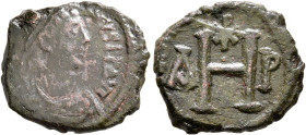 Justinian I, 527-565. 8 Nummi (Bronze, 19 mm, 3.81 g, 6 h), Thessalonica, 527-562. [D N IVSTI]NIANVS P P AV[...] Diademed, draped and cuirassed bust o...