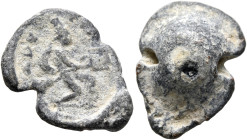 Phrygia (?), 3rd-4th centuries. Seal (Lead, 20 mm, 5.50 g). ΦPY Tyche (or Phrygia?), wearing mural crown, advancing right with billowing drapery behin...
