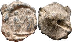 Anonymous, 3rd century. Seal (Lead, 18 mm, 4.67 g). Married couple (?): wife standing to right, clasping hands with husband standing facing, head turn...