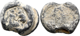 Anonymous, 3rd century. Seal (Lead, 20 mm, 13.45 g). A woman and a man dancing, holding hands, their other hands reaching towards each other above (a ...