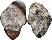 Anonymous, 4th century. Seal (Lead, 19 mm, 3.05 g). Draped bust of a lady to the left, wearing pearl earring and a braid folded back, over her coiffur...