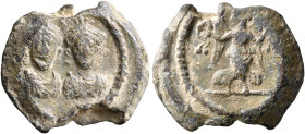 Honorius and Theodosius II (?), late 4th-early 5th centuries. Seal (Lead, 22 mm, 8.56 g, 12 h). Two crowned and draped imperial busts facing, cross be...