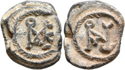 Johannes, 6th century. Seal (Lead, 18 mm, 4.88 g, 12 h). Block monogram within wreath. Rev. Block monogram IⲰANNOV within wreath. Unpublished in the s...