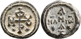 Uncertain, 6th century. Tessera (Lead, 17 mm, 6.51 g, 12 h). Cruciform monogram M, Φ, OV and P. Rev. HΛ - TⲰ - A/M/A/Ξ arranged in de form of a cross;...