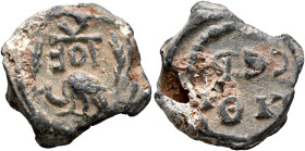 Petros and Sergios, circa 6th century. Seal (Lead, 18 mm, 5.91 g, 12 h). Block monogram ΠETPOV Peacock standing left, palm branches in the fields. Rev...