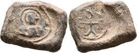 Eulogios, 6th-7th centuries. Seal (Lead, 30x24 mm, 34.17 g, 12 h). Nimbate facing bust of the Mother of God holding Christ. Rev. Cruciform monogram EV...
