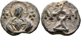 Domninos or Moundos, 6th-7th centuries. Seal (Lead, 17 mm, 4.65 g, 12 h). The Mother of God holding infant Christ, both nimbate; cross to her left and...