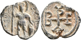 Belisarios, 6th-7th centuries. Seal (Lead, 20 mm, 6.29 g, 12 h). Saint Theodore, nimbate, standing facing, holding a spear in his right hand, and rest...